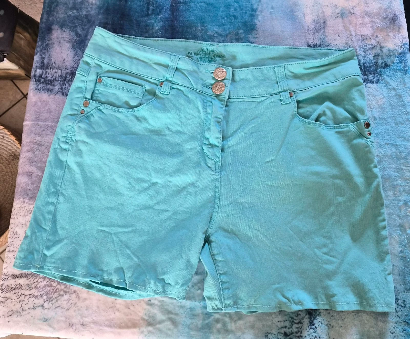 Short turquoise Patrice Bréal taille 42/XL